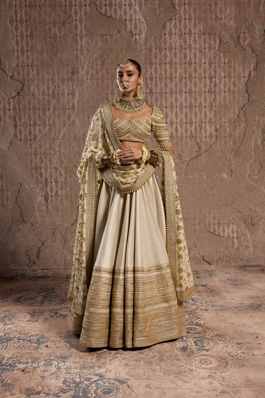 CLASSSIC IVORY LEHENGA WITH EMBELLISHED BORDER AND BLOUSE