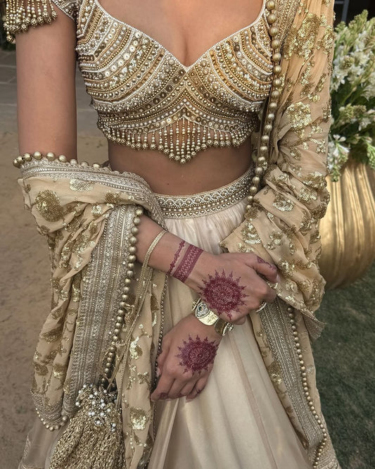 CLASSSIC IVORY LEHENGA WITH EMBELLISHED BORDER AND BLOUSE